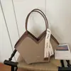 Bolso tote vintage de gran capacidad para mujer, nuevo modelo 2026, bolso de hombro de alta estética, bolso de axila de moda para commuting para mujer