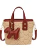 Bolso Peludo de Color Contrastante de Nicho para Mujer 2025 Nueva Moda Versátil Bolso Cruzado Peludo Muy Popular Bolso Bandolera Tipo Cubo