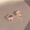 Aretes de tachuela de oro rosa de nicho de lujo ligero transfronterizos, exquisitos, modernos, versátiles, personalizados, adecuados para ir al trabajo, aretes simples y sofisticados