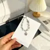 Llavero Dulce Simple y Versátil con Corazón de Perla, Estilo de Nicho, Lujo Ligero, Accesorio para Teléfono de Alta Gama