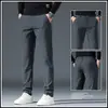 Pantalones casuales de verano para hombre, corte holgado, cintura elástica, pierna recta largos, pantalones de traje negros para primavera y otoño, estilo seda de hielo ultradelgada