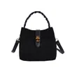 Bolso de mano nuevo de comercio exterior transfronterizo, bolso tipo cubo moderno y elegante para mujer, con un diseño único, adecuado para el trabajo diario, y se puede llevar como bolso de hombro o bolso cruzado