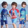 Traje de baño nuevo para niños y niñas 2025, una pieza, dibujos animados, para bebé y niño pequeño, secado rápido, traje de surf, protector solar, gorro de natación, conjunto