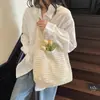 Bolso tejido hueco estilo coreano para mujer, nuevo bolso de mano informal de verano 2026 para vacaciones y viajes, bolso de hombro de gran capacidad