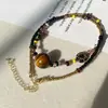 Colgante de Piedra Ojo de Tigre Estilo Étnico Vintage Collar Pequeño de Flores con Cuentas para Mujeres Personalidad Artística Tendencia de Moda Gargantilla Cadena para Suéter