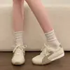 Zapatillas de entrenamiento alemanas de suela plana para mujer 2026 nuevo resorte versátiles populares zapatillas deportivas casuales con cordones Zapatos Forrest Gump zapatillas blancas
