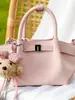 Bolso tipo cubo de moda transfronterizo para mujer, modelo nuevo de nicho 2026, bolso de hombro versátil y elegante, bolso de mano plisado y bolso cruzado a la moda