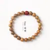 Pulsera de la serie Sándalo con diseño simple y elegante, con cuentas superiores de flor de loto de arena dorada púrpura, adecuada para hombres y mujeres, pulsera de pareja, cuentas budistas y accesorio cultural