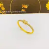 Fornecimento ao vivo cobre banhado a ouro moda incrustação irregular personalidade pulseira nó fivela pulseira joias femininas atacado