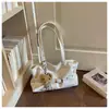 Bolso de axila de moda y tendencia para mujer, modelo nuevo, venta al por mayor transfronteriza, bolso de mano para el día a día, gran capacidad, de hombro y de mano para uso diario