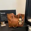 Bolsa de palha trançada estilo simples para mulheres, nova coleção 2026, bolsa de ombro de grande capacidade, bolsa de mão elegante e versátil