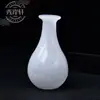 Tetera de Jade Blanco Esmaltado, Divisor de Vino, Taza de Té de Porcelana de Jade, Taza de Maestro, Taza de Doble Propósito, Juego de Té, Venta al por Mayor por Fabricante