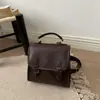 Mochila Estilo Doce e Feminino para Mulheres 2026 Nova Bolsa Escolar Estilo Cambridge College Bolsa de Ombro Único Transversal Multifuncional Primavera e Verão