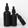 Venta al por mayor del fabricante Botella gotero de vidrio negro mate portátil de 10 ml Botella de aceite esencial 30 ml Botella vacía rellenable a prueba de luz para muestras cosméticas