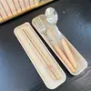 Mango de madera palillos japoneses cuchara al por mayor portátil acero inoxidable juego de vajilla para comida occidental cuchara de madera palillos de madera logo