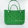 Bolsa de praia com furos em EVA portátil à prova d'água para viagem feminina lavável esportes areia piscina bolsa de praia atacado