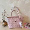 Bolsa feminina moderna de grande capacidade 2026 nova estilosa casual popular bolsa de mão bolsa de ombro tote grande estampada