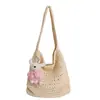 Bolso tejido nuevo estilo casual y relajado de nicho 2026, gran capacidad, bolso de hombro ligero, bolso tipo cubo calado, bolso de playa