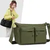 Bolso bandolera de gran capacidad para otoño e invierno para mujer, nuevo modelo 2026, mochila de viaje unisex, bolso de tela de color liso ligero casual