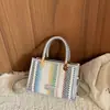Bolso pequeño cuadrado tejido de estilo étnico con bloques de color y diseño de bolso de mano vintage, adecuado para uso casual, bolso cruzado de nicho para el día a día