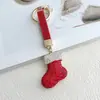 Colgante Llavero de Navidad con Pedrería de Arcilla Transfronterizo con Pedrería, Reno, Árbol de Navidad, Bastón de Santa Claus, Llavero para Bolsa