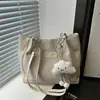 Bolso de Axila 2025 Nuevo de Gran Capacidad para Estudiantes Bolso de Clase Estética Femenina de un Solo Hombro Diseño de Nicho Bolso de Mano para Viajes