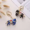 Nuevo Llavero de Caballo del Zodiaco Estéreo Pintura al Óleo Incrustada de Diamantes Estilo Chino Colgante para Bolsos de Hombre y Mujer de Metal Lindo