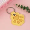 Llavero de almacenamiento conmemorativo para mascotas de cuero PU, bolsa portátil para pelo de pata de gato, en stock, colgante para recolección de pelo de mascotas