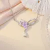 Collar gota lazo flor pequeña cadena clavicular diseño nicho temperamento ins versátil sensación de alta gama accesorios de acero de titanio