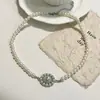Dulce Collar Chanel Saturno Rodeado de Perlas Flor Cadena para Clavícula Elegante Retro Elegante de Lujo Alto de Moda