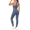 Conjunto de outfit de yoga ajustado con diseño deportivo en la espalda, de tela cepillada con bloques de color transfronterizos, sensación nude, pantalones largos de cintura alta para levantar glúteos para correr y fitness