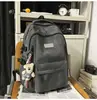 Mochila Nueva Casual Transfronteriza de Gran Capacidad Ligera, Mismo Estilo Outdoor Impermeable de Nylon para Estudiantes Hombres y Mujeres
