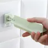 Suporte de Rack de Armazenamento com Clipe de Pendurar na Parede Criativo para Casa Plástico sem Perfuração Clipe Suporte de Roupas Adesivo Sem Costura Rack de Arquivamento