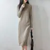 Outono/Inverno 2026 Novo Vestido de Tricô Puro Lã Gola Redonda Meia-Alta Manga Longa Feminino Padrão Torcido Vazado Saia Média