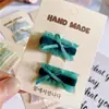 Versión coreana de pinza para el pelo de lazo simple de temperamento infantil, anillo para el pelo, accesorios clásicos de encaje para el pelo de niñas, pinza lateral para el flequillo, venta al por mayor