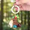 Campanilla de viento con cáscara de fruta natural Colgante tejido para planta Campana de mano curativa Llavero para coche Obra de arte estilo bosque Regalo