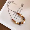 Collar de cordón de cuero con cuentas de madera y colgante cuadrado geométrico, cadena para la clavícula de estilo étnico vintage, accesorio de diseño nicho