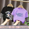 Ropa para niños para niños, camiseta de manga larga de retazos, imitación de dos piezas, camiseta base de algodón puro para niños mayores, nuevo estilo de top para primavera y otoño 2026