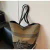 Bolsa de Lona Listrada Transfronteiriça Feminina Grande Capacidade 2025 Nova Outono e Inverno Versátil Simples Bolsa de Ombro Bolsa Tote para Estudante Universitário