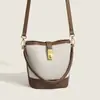 Bolsas de Verano Transfronterizas para Mujer 2026 Nuevo Estilo Coreano de Moda Bolsos Texturizados Bolsos Cubo Bolsos de Lona Bolsos Cruzados Fabricante