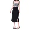 Falda casual para mujer talla grande gordita verano nuevo diseño con sentido de la moda pequeña que estiliza cintura alta longitud media línea A falda larga