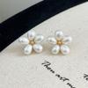 Pendientes de perlas con pequeñas flores, elegantes y bonitos, de estilo coreano, ligeros, lujosos y con un toque avanzado, exquisitos y explosivos que combinan con todo.
