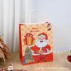 Bolsa de regalo de Navidad en existencia Bolsa de embalaje de manzana de caramelo de Nochebuena Bolsa de papel kraft de regalo de mano portátil de dibujos animados