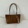 Nueva colección de primavera 2026: Bolso de mano para mujer estilo coreano, con un elegante diseño color block, gran capacidad y correa para el hombro, lo que lo convierte en un bolso tote versátil para ventas transfronterizas.