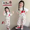 Traje de Manga Corta para Niña Verano 2026 Nuevo Elegante Conjunto de Verano de Dibujos Animados para Niños Pantalones Anti-Mosquitos de Cuadros para Bebé Conjunto de Dos Piezas