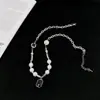 Collar de Acero de Titanio Europeo y Americano para Hombre Tendencia Vintage Colgante de Piedra Negra Collar de Perlas Lujo Ligero Nicho Cadena para Suéter Todo Fósforo Joyería
