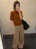 Top de punto MMC de lana con cuello alto y manga corta, colección otoño 2026, diseño simple, suave y favorecedor, manga tres cuartos, 63M61137