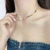 Collar de perlas de piedra natural de dopamina para mujer, novedad de 2024, cadena de clavícula de lujo de nicho de verano, elegante cadena de cuello con cuentas.