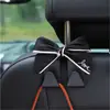 Gancho para Coche con Forma de Lazo, Elegante Gancho para Respaldo de Asiento de Coche, Suministros de Moda para el Interior del Coche al por Mayor