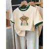 Camiseta de Manga Corta de Algodón Puro con Bloques de Color y Hombros Rectos para Mujer, Diseño Único, Moderna, Versátil, Top Adelgazante, Verano 2026